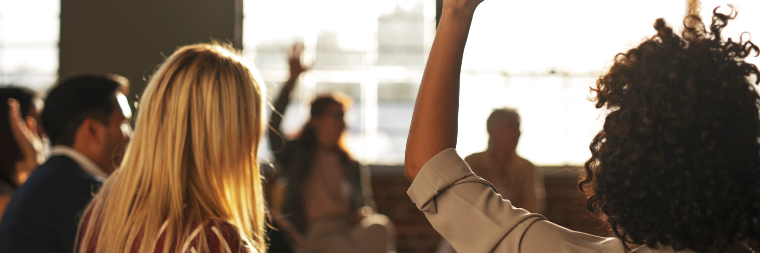 People raising their hands